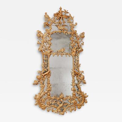 AN UNUSUAL ENGLISH GILTWOOD MIRROR