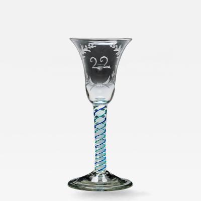 AN UNUSUAL ENGRAVED BLUE GREEN COLOUR TWIST