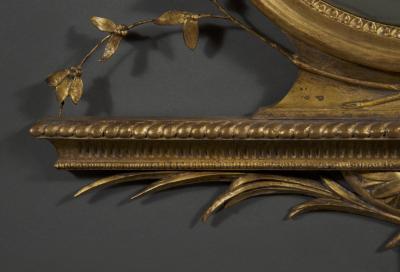 AN UNUSUAL GEORGE III GILTWOOD AND COMPOSITION CONVEX MIRROR