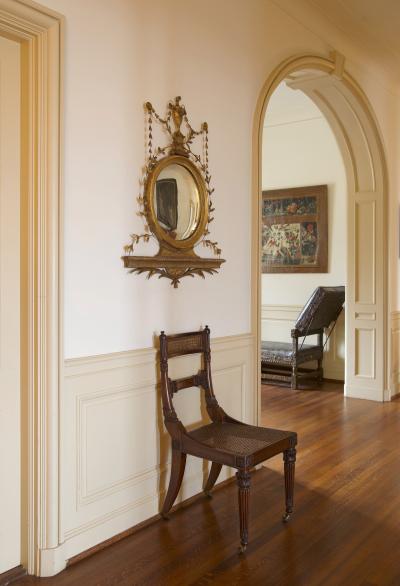 AN UNUSUAL GEORGE III GILTWOOD AND COMPOSITION CONVEX MIRROR