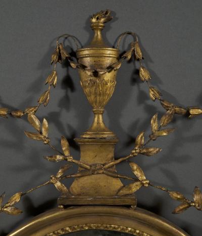 AN UNUSUAL GEORGE III GILTWOOD AND COMPOSITION CONVEX MIRROR