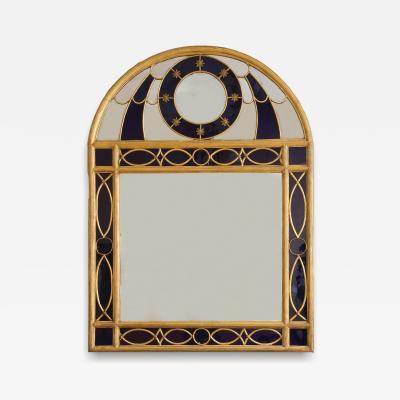AN UNUSUAL GILTWOOD AND GILT PEWTER MIRROR SET WITH BLUE GLASS