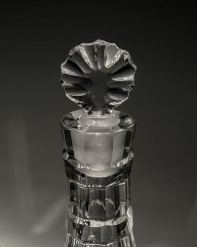 AN UNUSUAL PAIR OF IRISH CUT GLASS DECANTERS