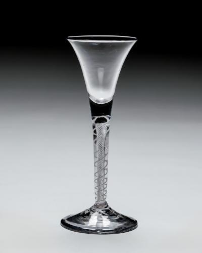 AN UNUSUAL PAIR OF MIXED TWIST WINE GLASSES