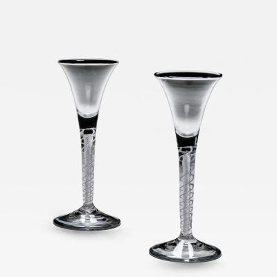 AN UNUSUAL PAIR OF MIXED TWIST WINE GLASSES