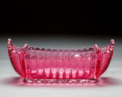 AN UNUSUAL RECTANGULAR RICHLY CUT PINK FRUIT BOWL