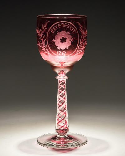 AN UNUSUAL SET OF SIX COLOUR TWIST JACOBITE GLASSES