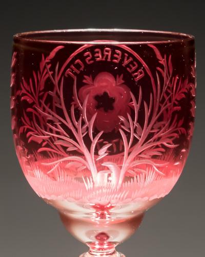 AN UNUSUAL SET OF SIX COLOUR TWIST JACOBITE GLASSES