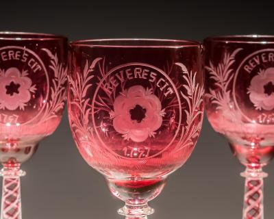 AN UNUSUAL SET OF SIX COLOUR TWIST JACOBITE GLASSES