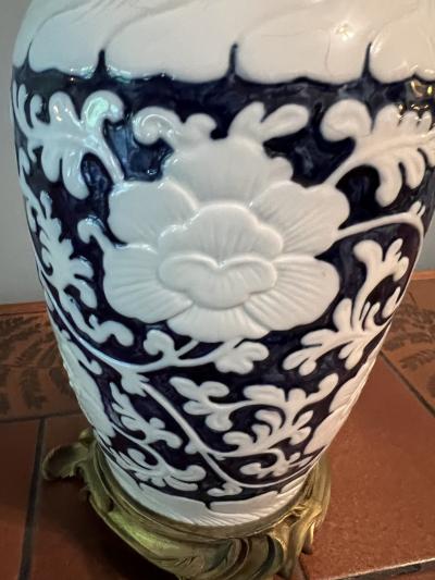 ANTIQUE CHINESE BLACK AND WHITE FLORAL CERAMIC LAMP WITH BRONZE MOUNTS