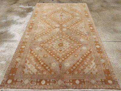 ANTIQUE EAST TURKESTAN KHOTAN CARPET