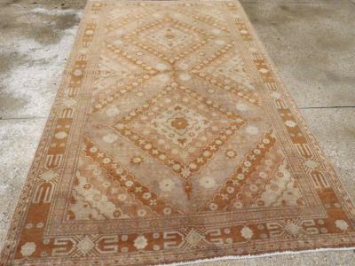 ANTIQUE EAST TURKESTAN KHOTAN CARPET