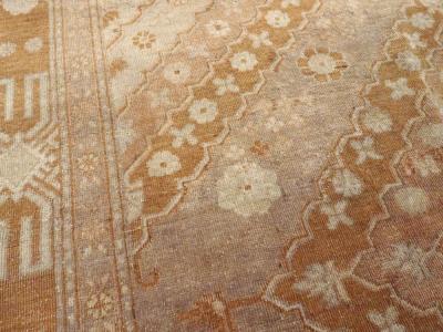 ANTIQUE EAST TURKESTAN KHOTAN CARPET