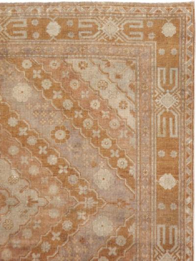 ANTIQUE EAST TURKESTAN KHOTAN CARPET