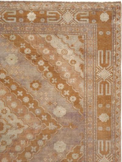 ANTIQUE EAST TURKESTAN KHOTAN CARPET