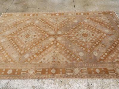 ANTIQUE EAST TURKESTAN KHOTAN CARPET