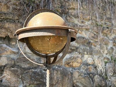 ANTIQUE GLOBE IN DECORATIVE IRON STAND WITH TRIPOD BASE