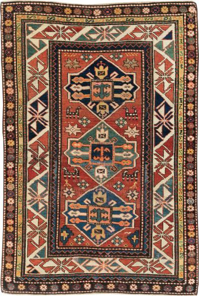 ANTIQUE KAZAK RUG