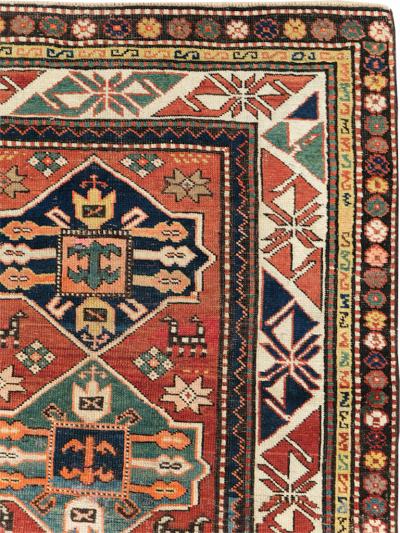 ANTIQUE KAZAK RUG