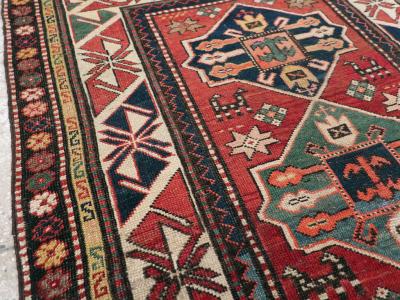 ANTIQUE KAZAK RUG