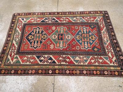 ANTIQUE KAZAK RUG
