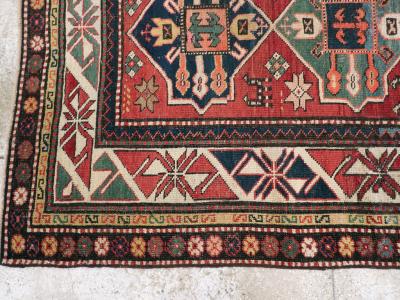 ANTIQUE KAZAK RUG