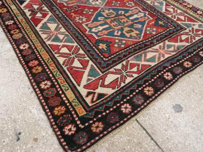 ANTIQUE KAZAK RUG