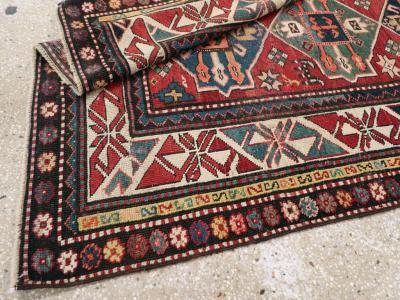 ANTIQUE KAZAK RUG