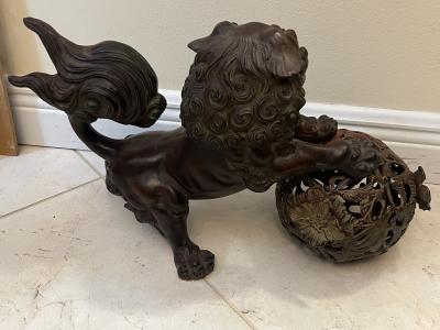 ANTIQUE PATINATED IRON FOO DOG WITH GILT BALL WITH FLOWERS SCULPTURE
