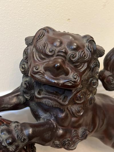 ANTIQUE PATINATED IRON FOO DOG WITH GILT BALL WITH FLOWERS SCULPTURE