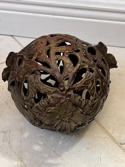 ANTIQUE PATINATED IRON FOO DOG WITH GILT BALL WITH FLOWERS SCULPTURE