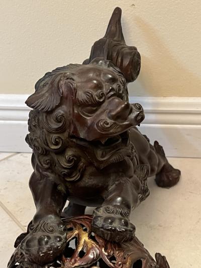ANTIQUE PATINATED IRON FOO DOG WITH GILT BALL WITH FLOWERS SCULPTURE