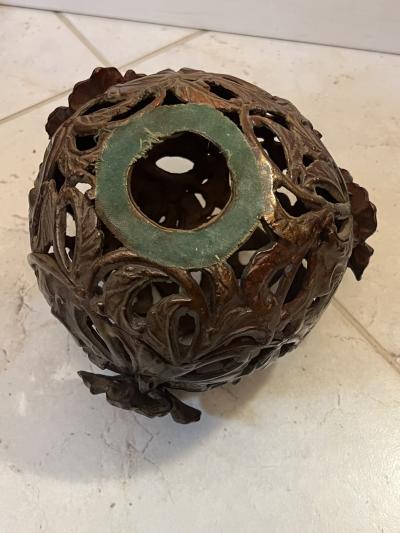 ANTIQUE PATINATED IRON FOO DOG WITH GILT BALL WITH FLOWERS SCULPTURE