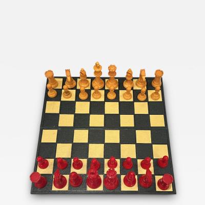 ART DECO ERA RED AND YELLOW BAKELITE CHESS SET WITH BOARD IN MOCK ALLIGATOR CASE