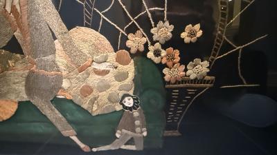 ART DECO NEEDLEWORK OF STYLIZED WOMAN SMOKING UPON DIVAN PIERROT DOLL WALL ART