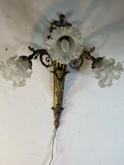 ART NOUVEAU FRENCH BRONZE CUPID SCONCE WITH THREE FANCY GLASS FLOWER SHADES