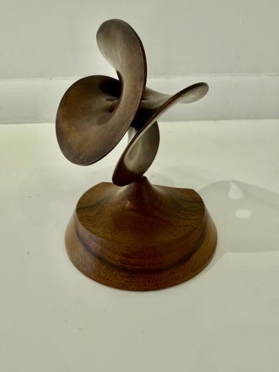 Abstract Bronze sculpture with a patinated copper finish 