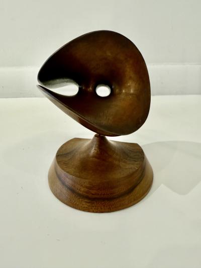 Abstract Bronze sculpture with a patinated copper finish 
