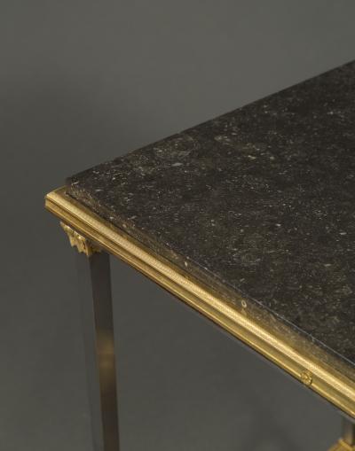 Adam Weisweiler AN EXQUISITE STEEL AND GILT BRONZE CENTER TABLE WITH FOSSIL MARBLE TOP