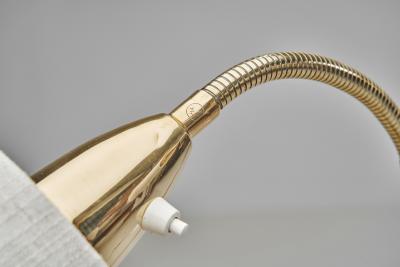 Adjustable Two Armed Wood and Brass Floor Lamp Europe ca 1940s