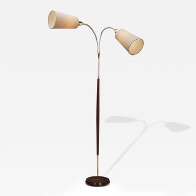 Adjustable Two Armed Wood and Brass Floor Lamp Europe ca 1940s