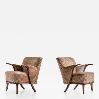 Adolf Wrenger Sculptural Pair of Adolf Wrenger Armchairs in Beech and Velvet Germany 1950s