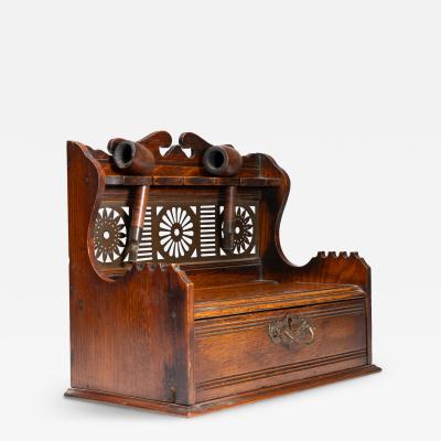 Aesthetic Movement Oak Pipe Rack with a Japanese Style Brass Fretwork Backplate