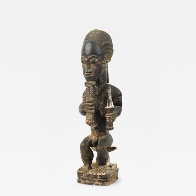 African Ivory Coast 20th Century Carved Wood Baule Diviner Seated Figure