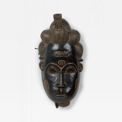 African Ivory Coast 20th Century Carved Wood Baule Male Face Mask