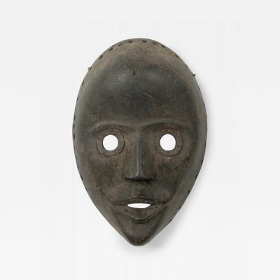 African Ivory Coast 20th Century Carved Wood Dan Face Mask Wall Plaque