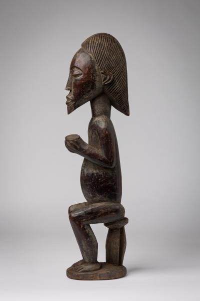 African Ivory Coast Wooden Figure of Male with Bowl