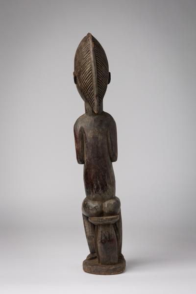 African Ivory Coast Wooden Figure of Male with Bowl