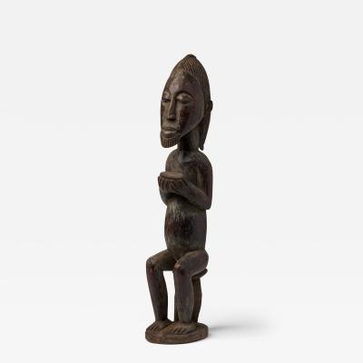 African Ivory Coast Wooden Figure of Male with Bowl