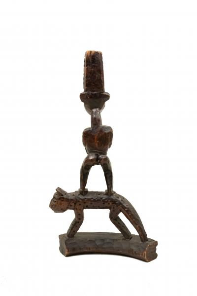African Sculpture of a Figure Standing on a Leopard